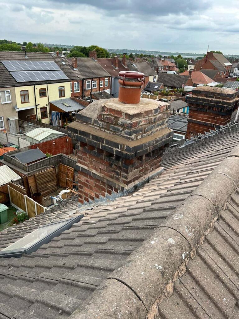 This is a photo taken from a roof which is being repaired by Gainsborough Roofing Repairs, it shows a street of houses, and their roofs